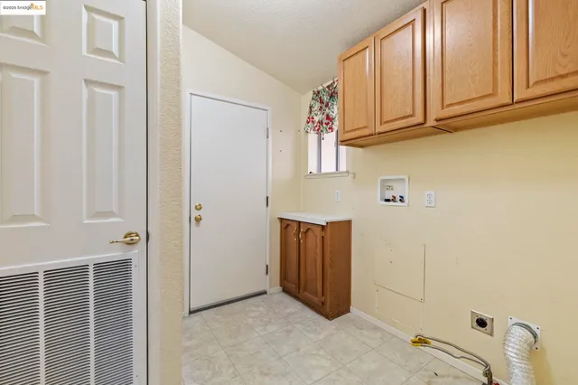 a view of kitchen with cabinet