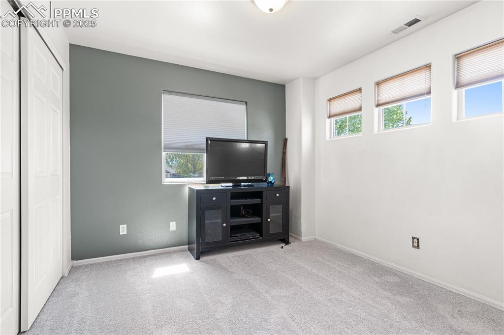 2000 Toronto Street Pueblo, CO 81004 - Photo 15 of 25 a living room with furniture and a flat screen tv