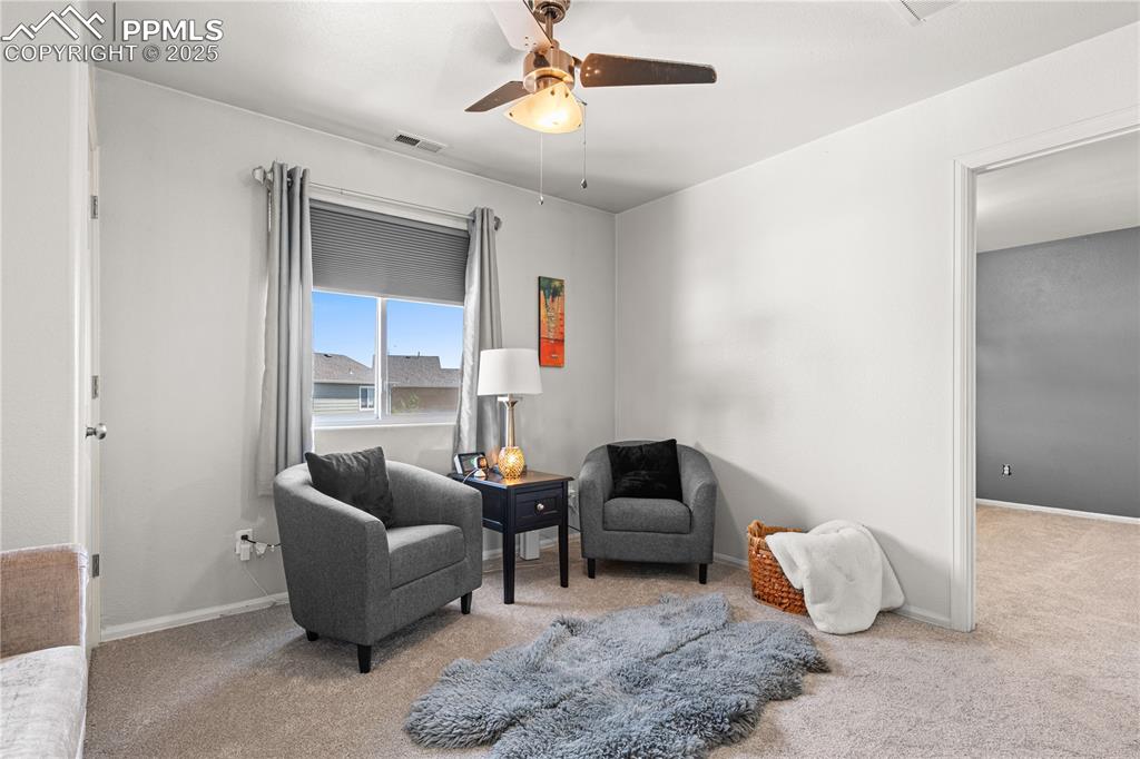 2000 Toronto Street Pueblo, CO 81004 - Photo 19 of 25 a living room with furniture rug and window