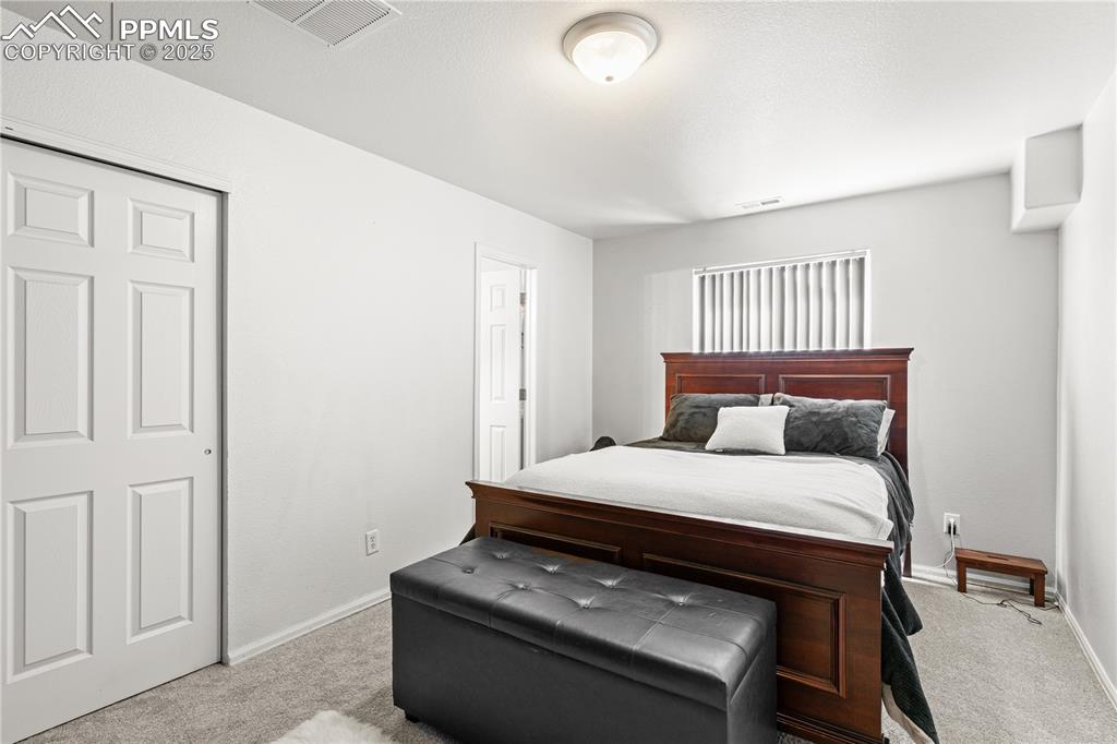 2000 Toronto Street Pueblo, CO 81004 - Photo 10 of 25 a bedroom with a bed and a window