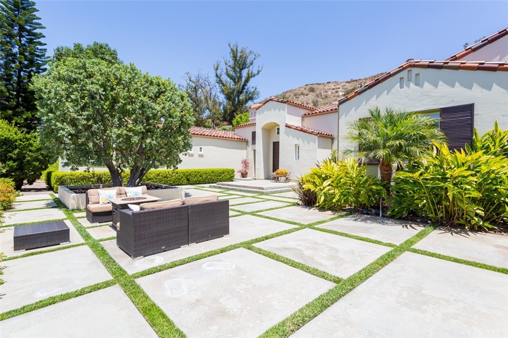 1785 North Kimbark Lane Orange, CA 92869 - Photo 4 of 35 a view of a house with backyard and sitting area