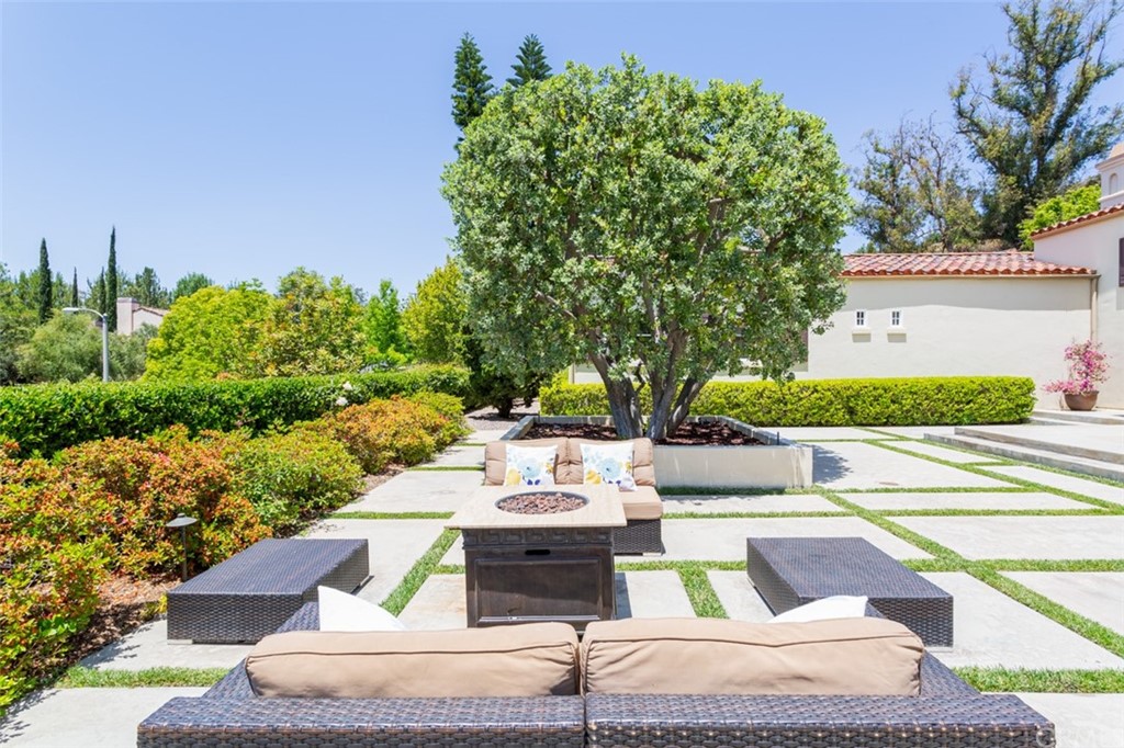 1785 North Kimbark Lane Orange, CA 92869 - Photo 6 of 35 a view of a patio with couches table and chairs and potted plants