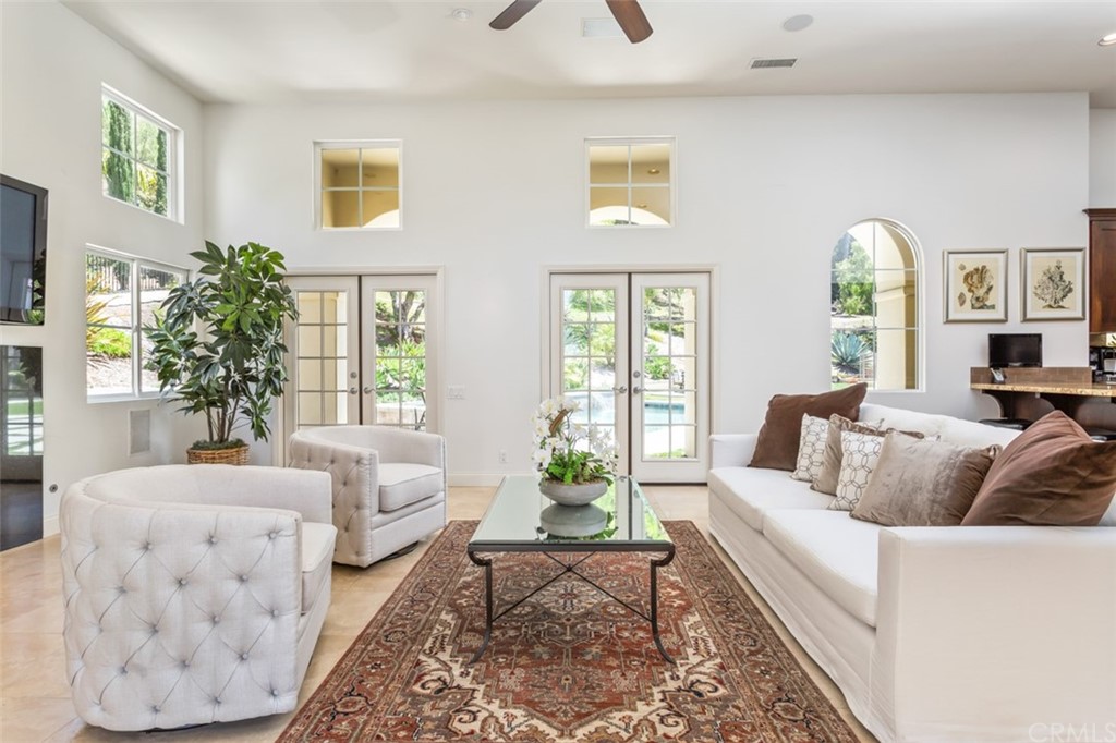 1785 North Kimbark Lane Orange, CA 92869 - Photo 7 of 35 a living room with furniture and a large window