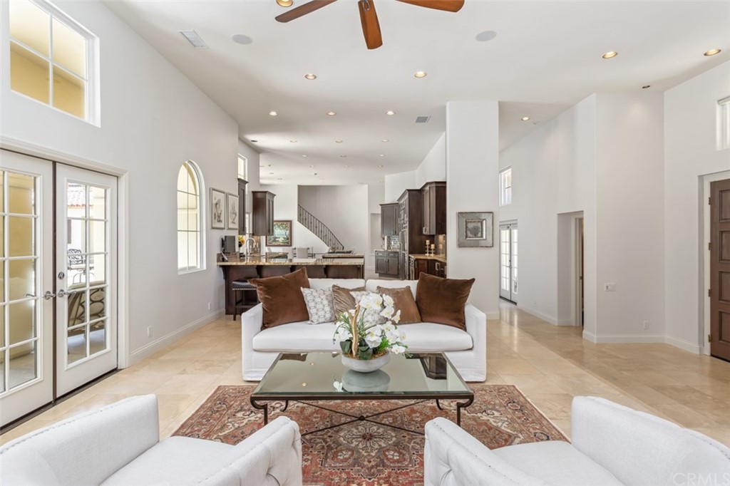 1785 North Kimbark Lane Orange, CA 92869 - Photo 8 of 35 a living room with furniture and a dining table
