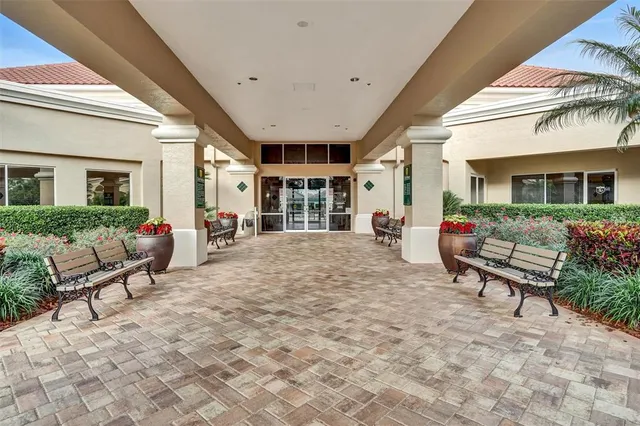 an aerial view of a house with yard