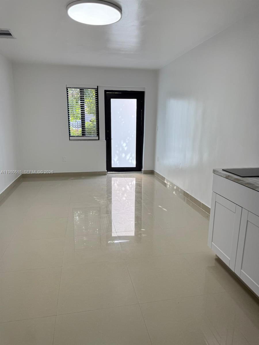 an empty room with windows