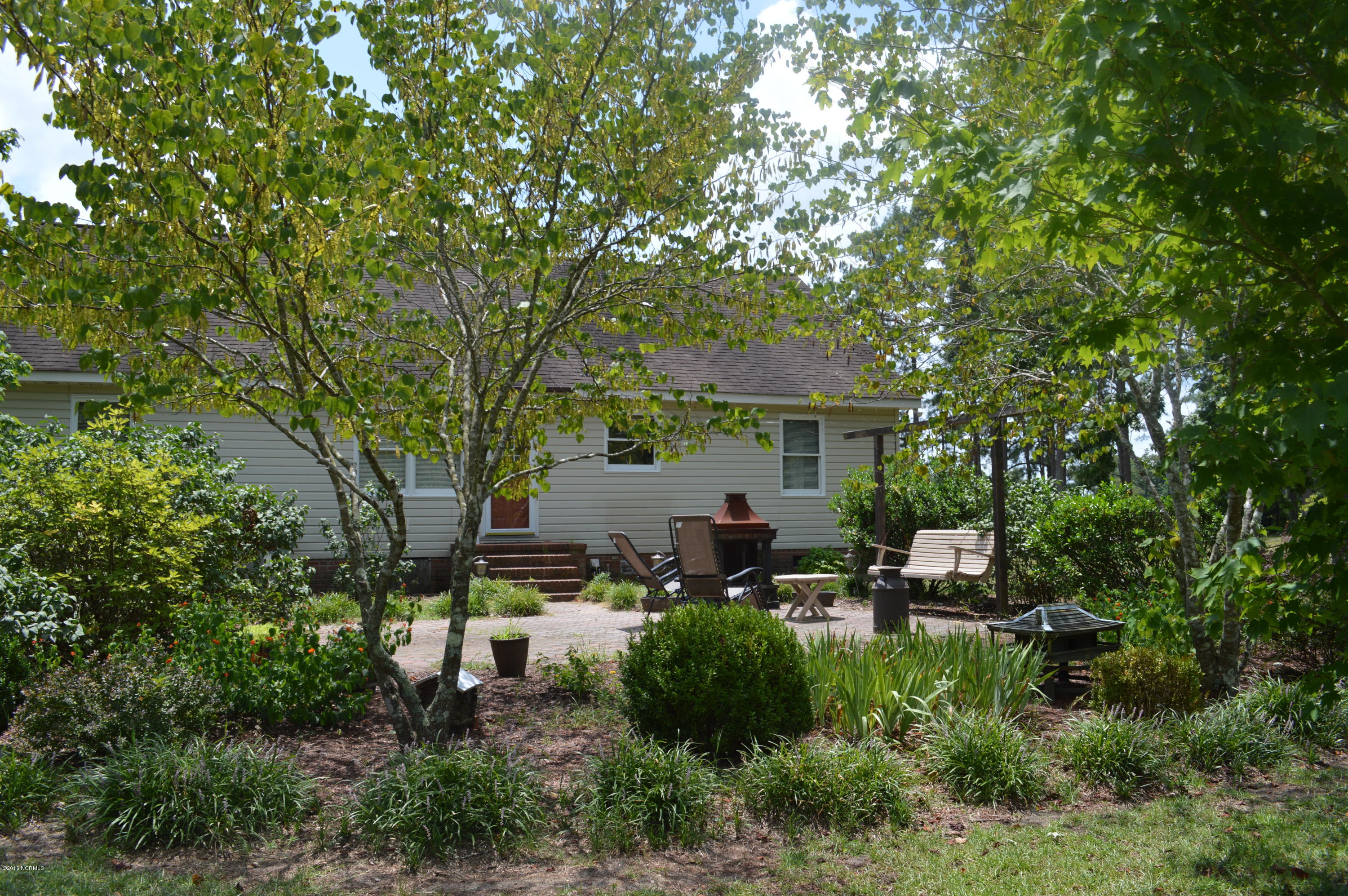 4516 Strickland Road Bailey, NC 27807 - Photo 16 of 17 Rear View with Patio