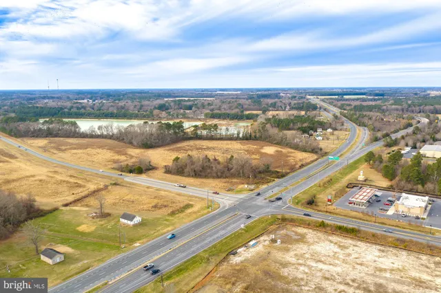 an aerial view of swimming pool with a yard