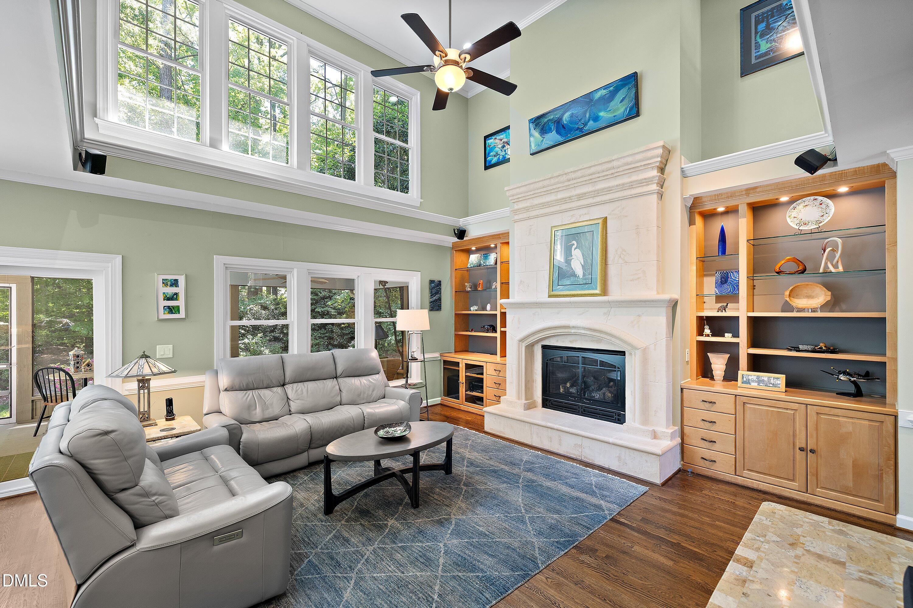 3608 Summer Leaf Court Raleigh, NC 27615 - Photo 12 of 63 a living room with furniture fireplace and flat screen tv