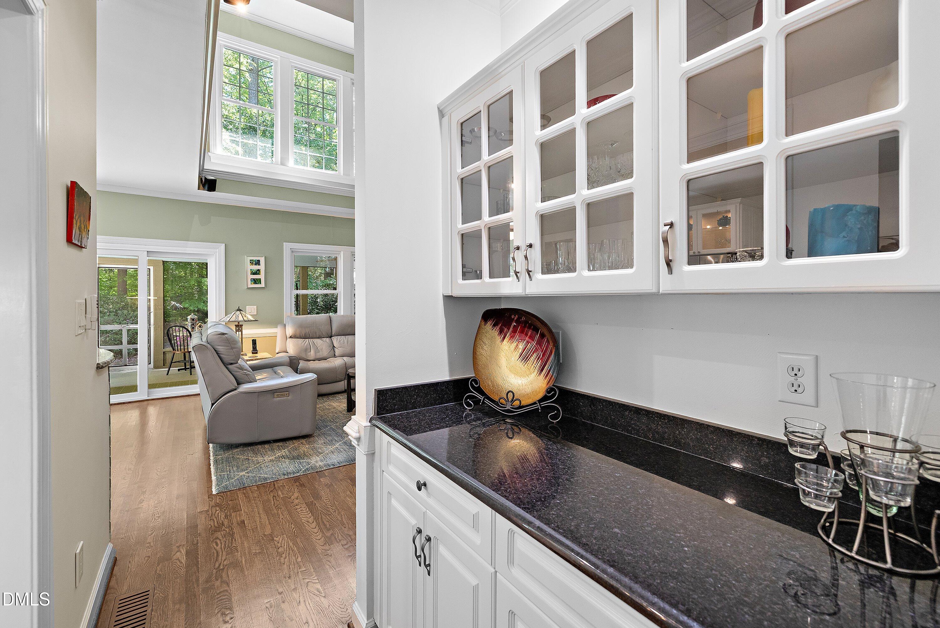 3608 Summer Leaf Court Raleigh, NC 27615 - Photo 28 of 63 a living room with furniture and a large window