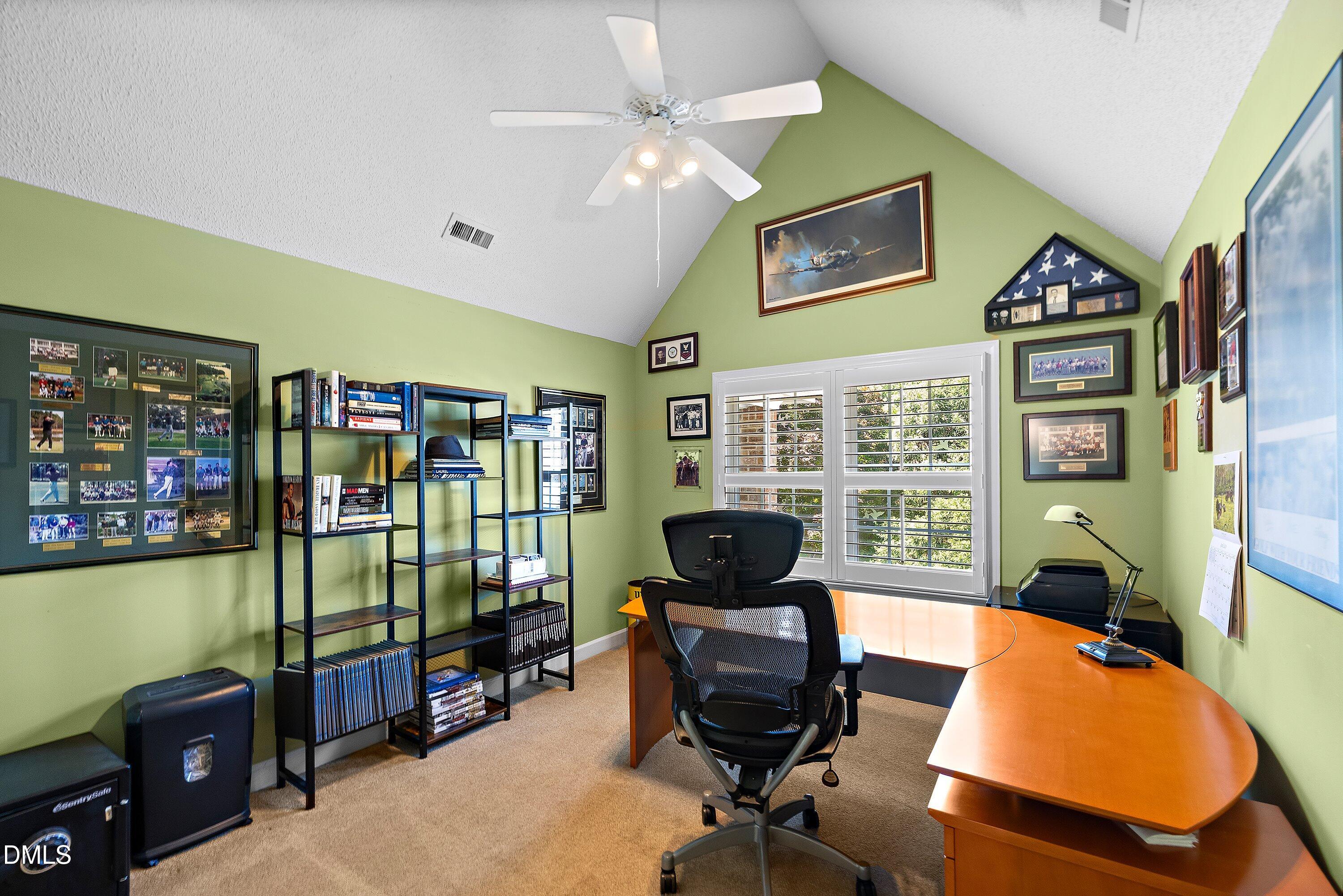 3608 Summer Leaf Court Raleigh, NC 27615 - Photo 43 of 63 a living room with furniture and a flat screen tv