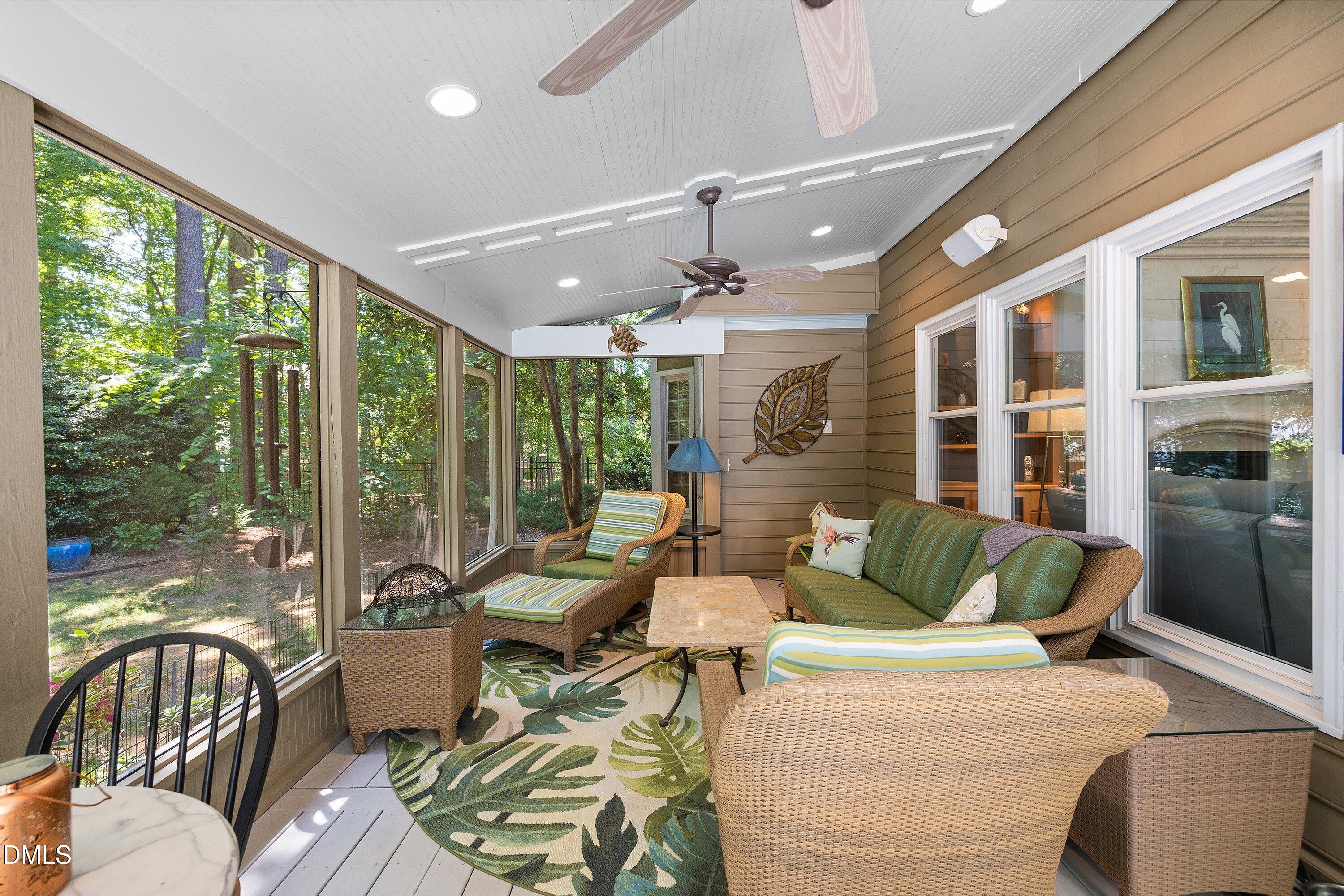 3608 Summer Leaf Court Raleigh, NC 27615 - Photo 51 of 63 a living room with furniture and large windows