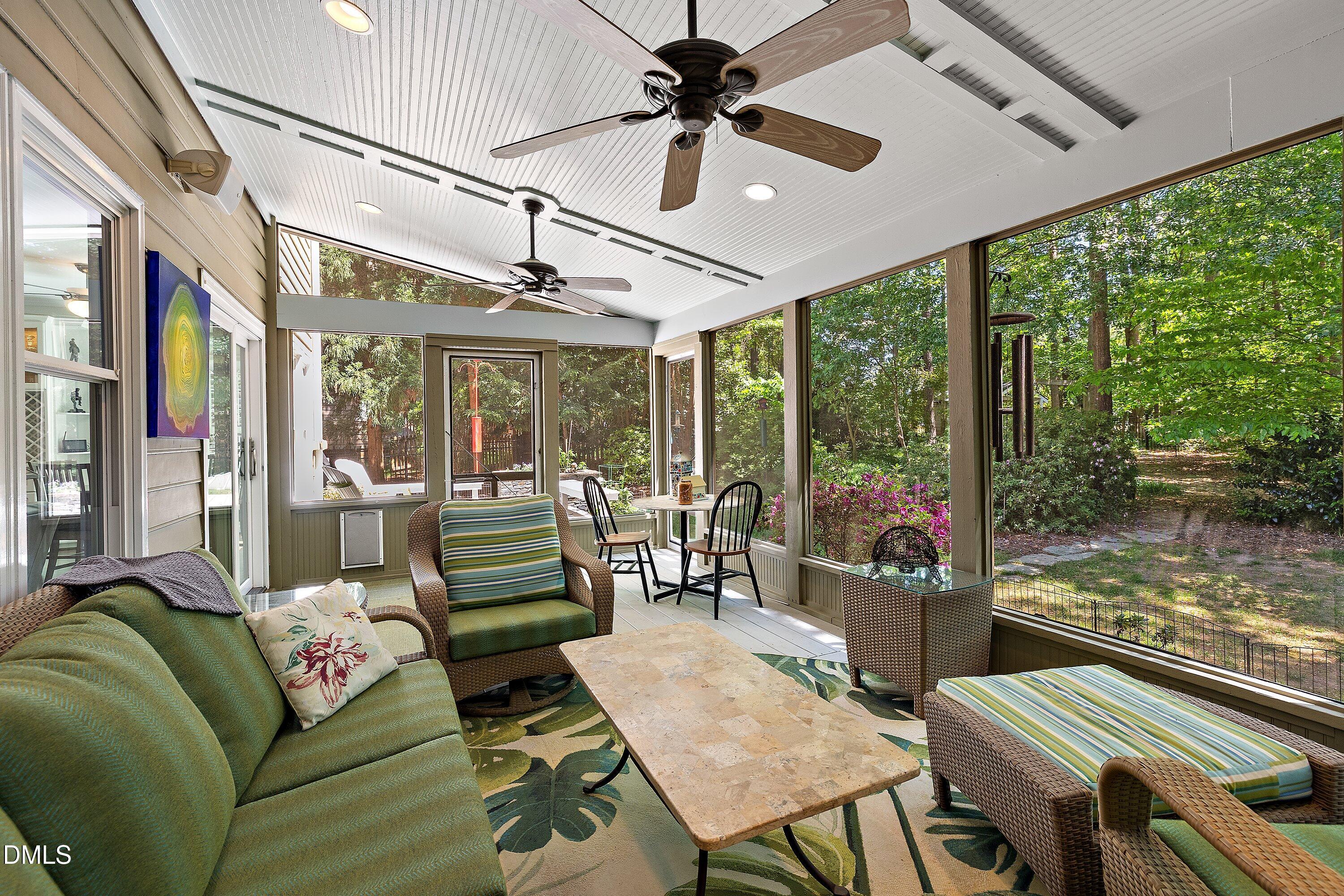 3608 Summer Leaf Court Raleigh, NC 27615 - Photo 52 of 63 a living room with furniture and a large window