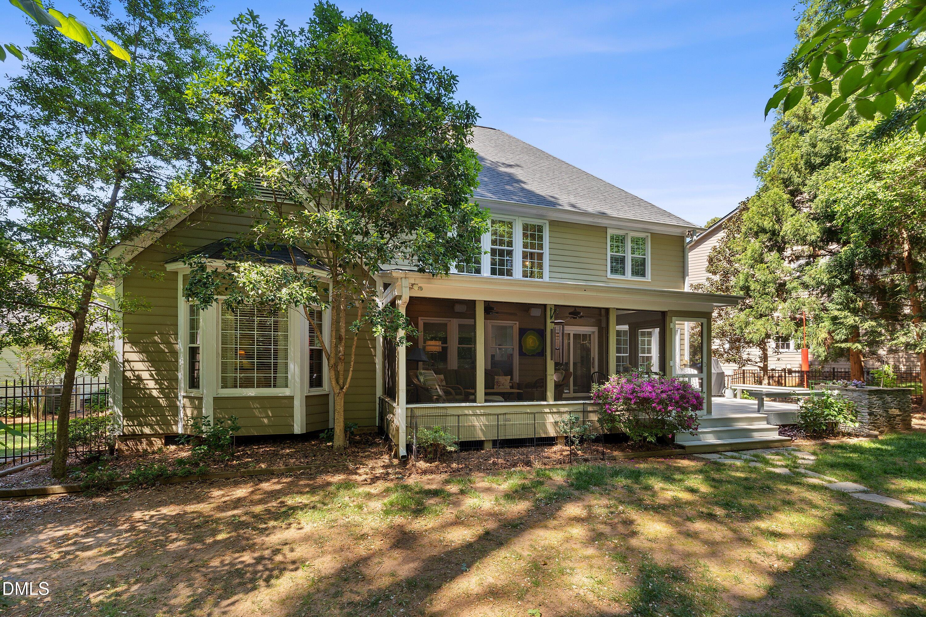 3608 Summer Leaf Court Raleigh, NC 27615 - Photo 57 of 63 a front view of a house with a garden