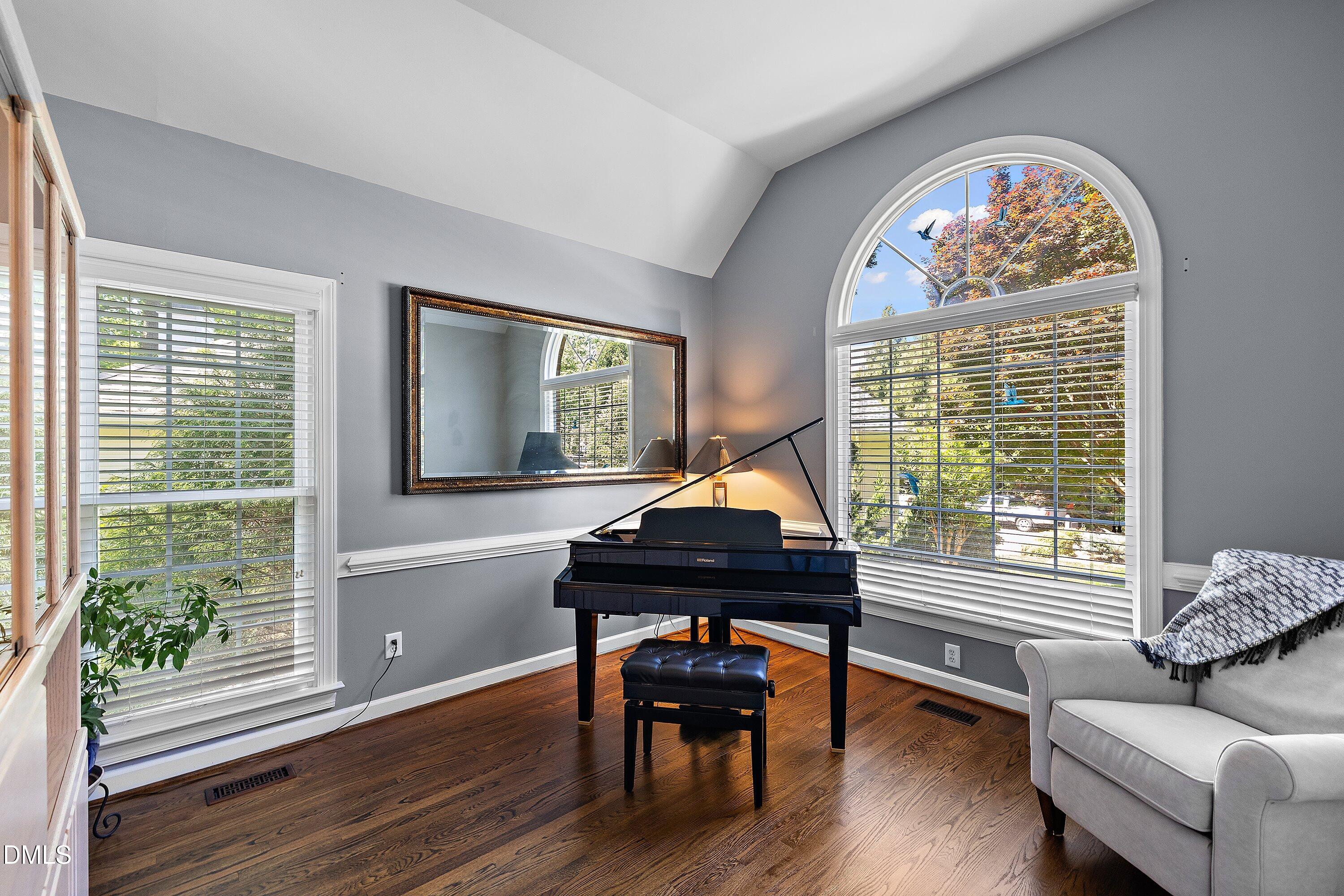 3608 Summer Leaf Court Raleigh, NC 27615 - Photo 6 of 63 a living room with furniture and a window