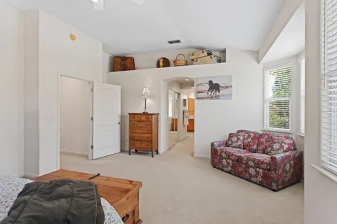 a living room with furniture and a couch