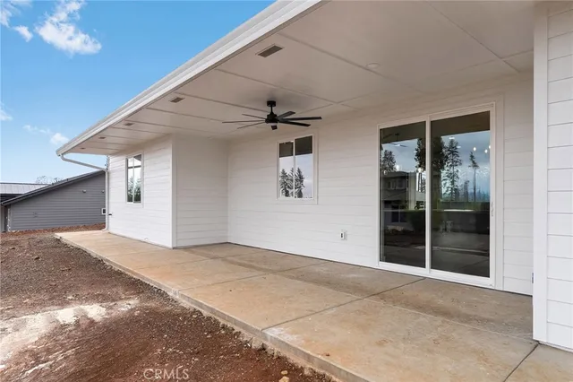 a view of a big room with windows