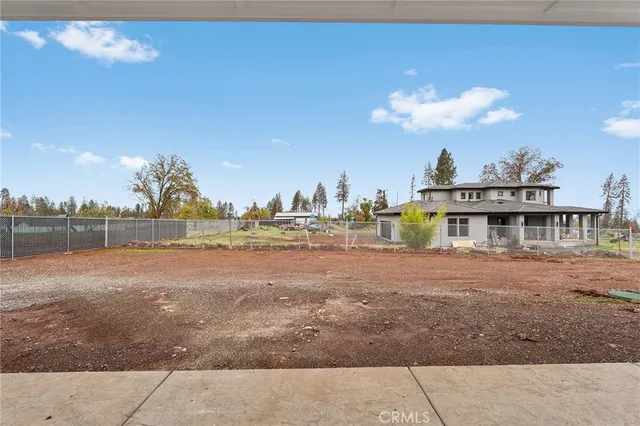 an aerial view of residential building and parking space