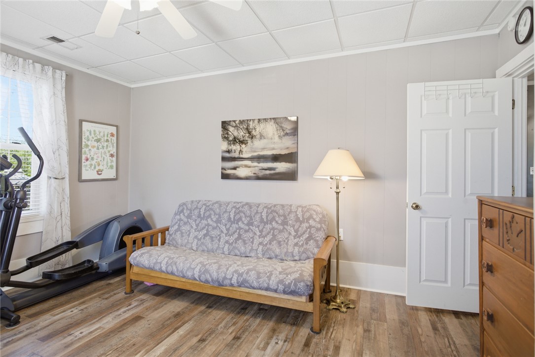 175 Burkett Road Seneca, SC 29672 - Photo 11 of 47 This versatile room features durable flooring and ample natural light, ideal for various uses.