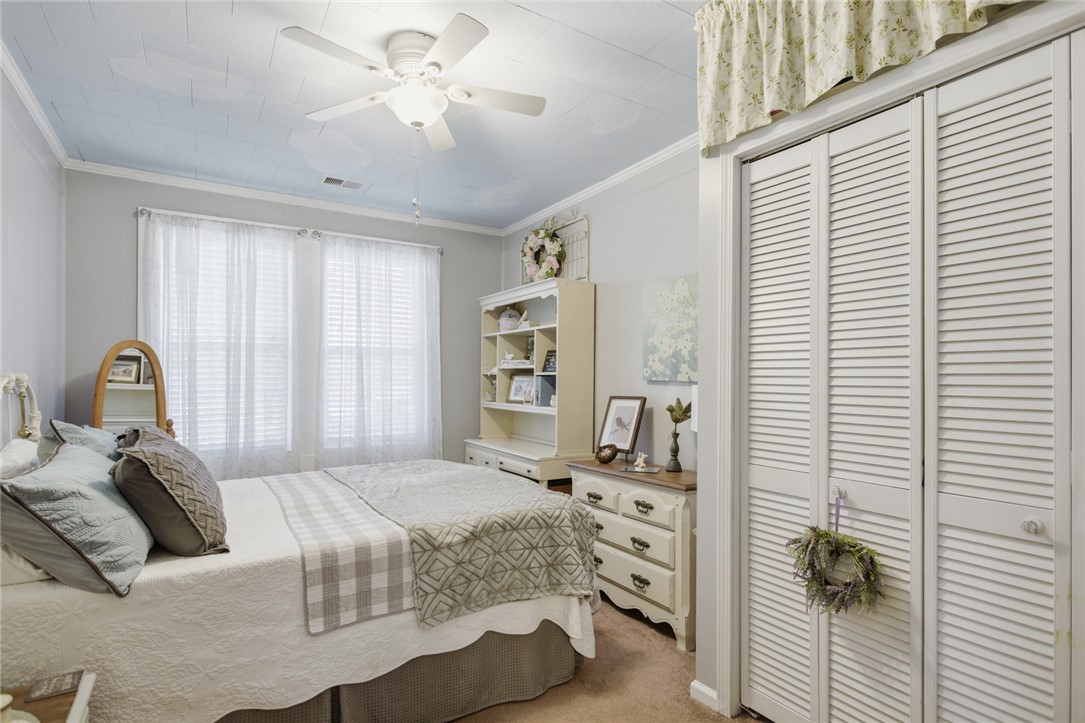 175 Burkett Road Seneca, SC 29672 - Photo 12 of 47 This cozy room offers a serene escape, perfect for peaceful slumber and relaxation.