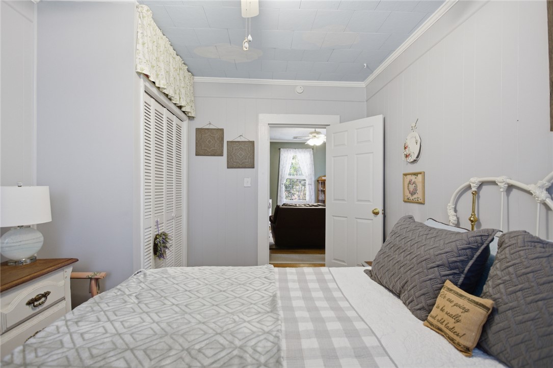 175 Burkett Road Seneca, SC 29672 - Photo 14 of 47 This cozy bedroom offers a tranquil retreat with charming architectural details and natural light.