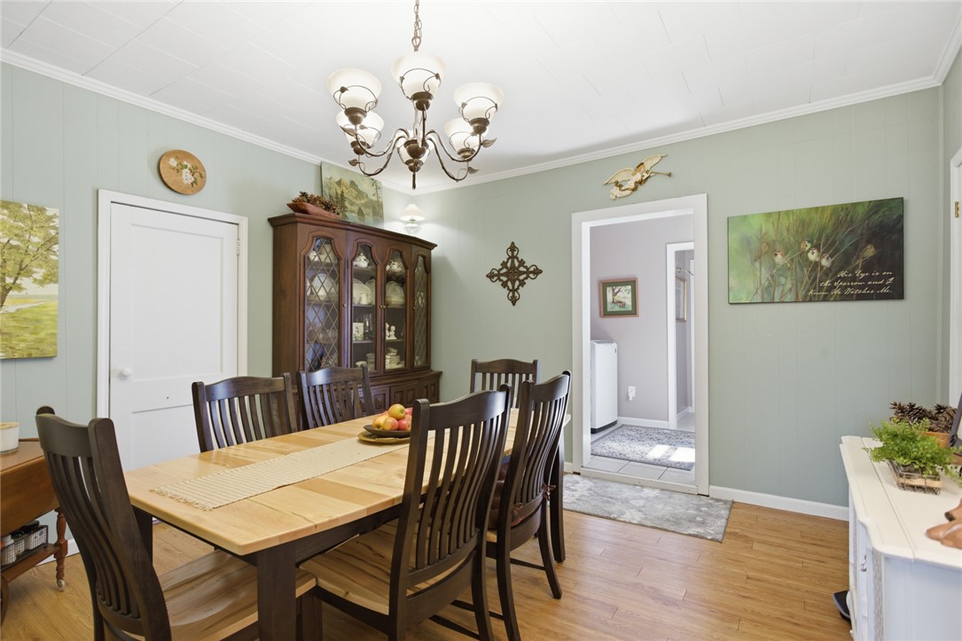 175 Burkett Road Seneca, SC 29672 - Photo 15 of 47 This dining area features bright lighting, warm flooring, and a seamless transition to other living spaces.