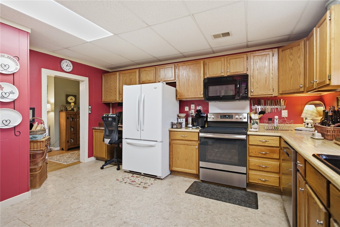 175 Burkett Road Seneca, SC 29672 - Photo 20 of 47 This spacious kitchen offers a seamless blend of functionality and comfort.
