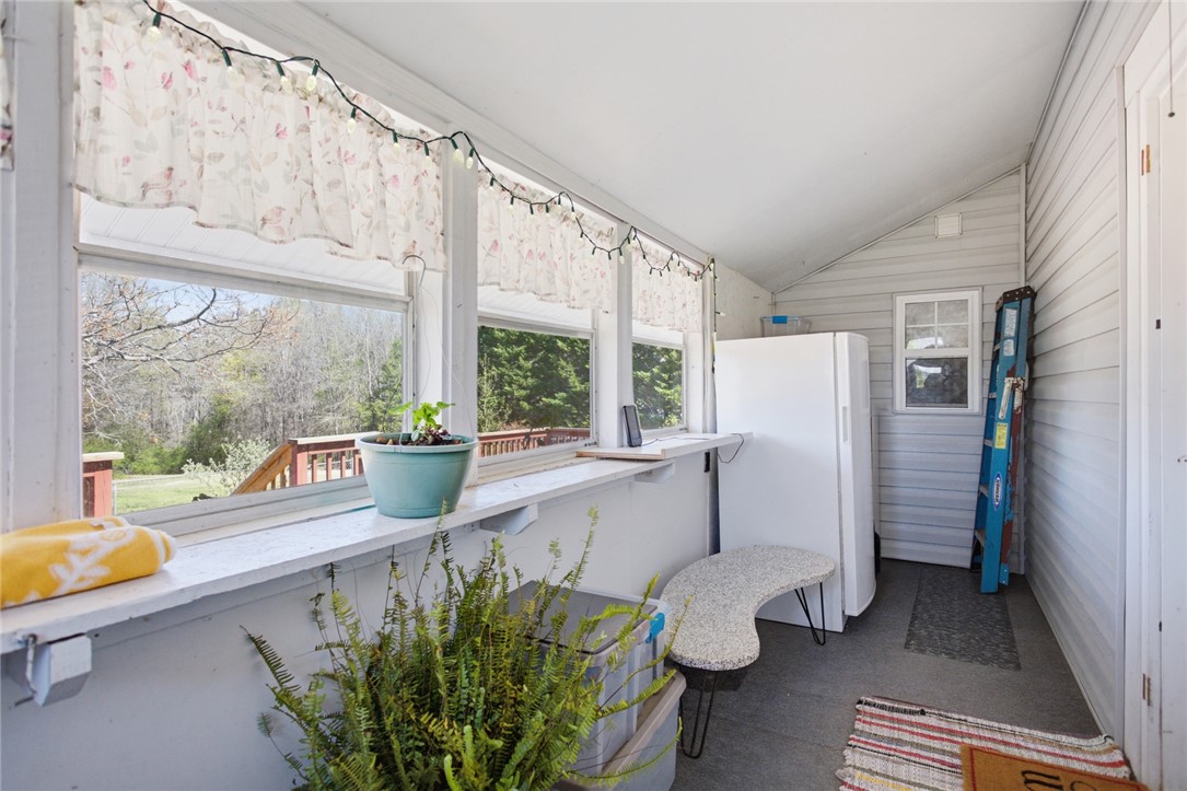 175 Burkett Road Seneca, SC 29672 - Photo 24 of 47 This bright sunroom provides a versatile space with ample natural light.