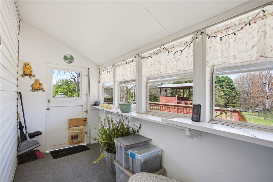 175 Burkett Road Seneca, SC 29672 - Photo 25 of 47 This bright sunroom offers expansive views and natural light, perfect for peaceful mornings or tranquil evenings.
