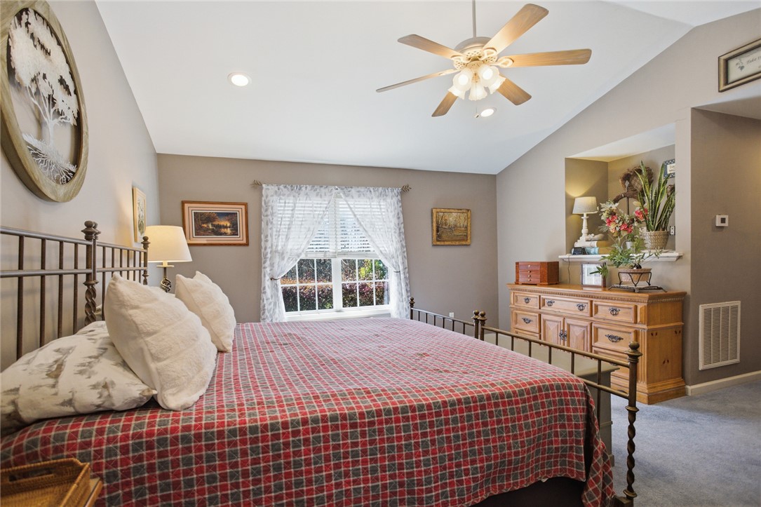 175 Burkett Road Seneca, SC 29672 - Photo 29 of 47 This spacious room features vaulted ceilings, providing an airy and open atmosphere.