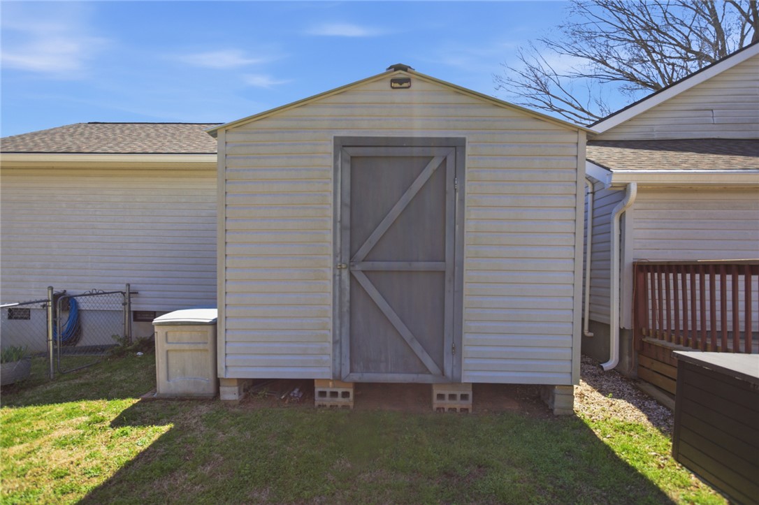 175 Burkett Road Seneca, SC 29672 - Photo 38 of 47 This outdoor shed offers practical storage solutions within a well-maintained yard.