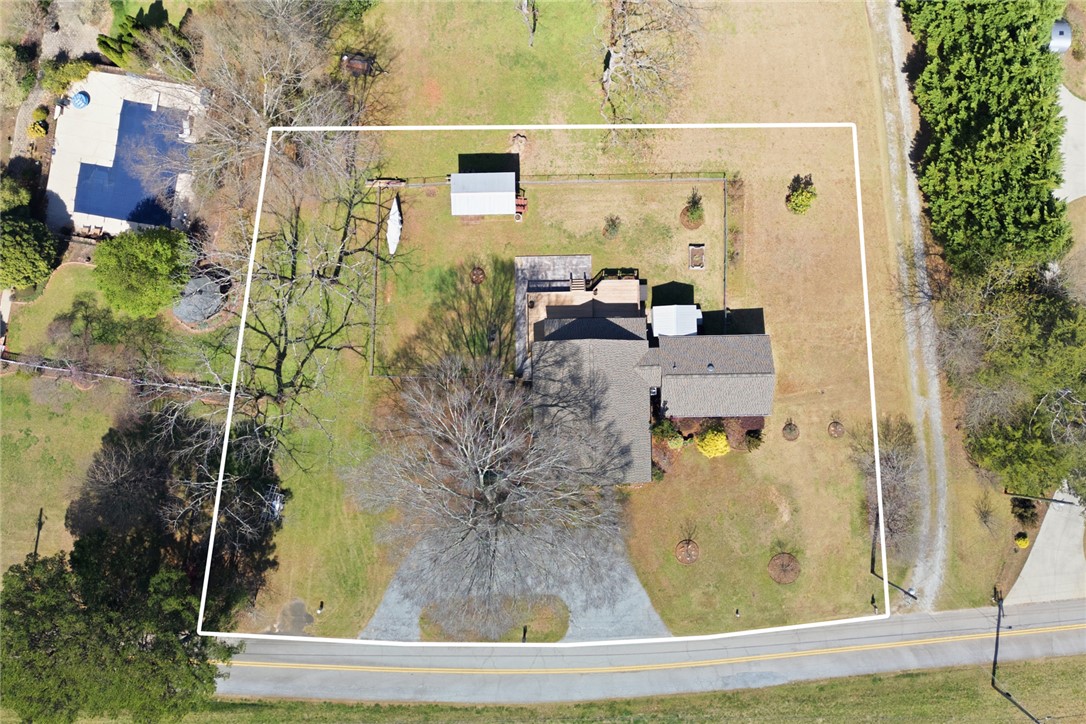 175 Burkett Road Seneca, SC 29672 - Photo 44 of 47 This property offers a vast expanse of land with a spacious yard and inviting outdoor amenities.