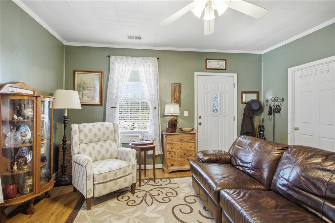 175 Burkett Road Seneca, SC 29672 - Photo 8 of 47 This living area offers a warm and inviting atmosphere, perfect for relaxation and everyday living.