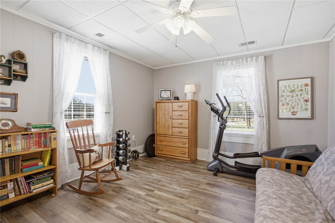 175 Burkett Road Seneca, SC 29672 - Photo 9 of 47 This versatile room offers bright natural light and durable flooring, ideal for a flexible space.