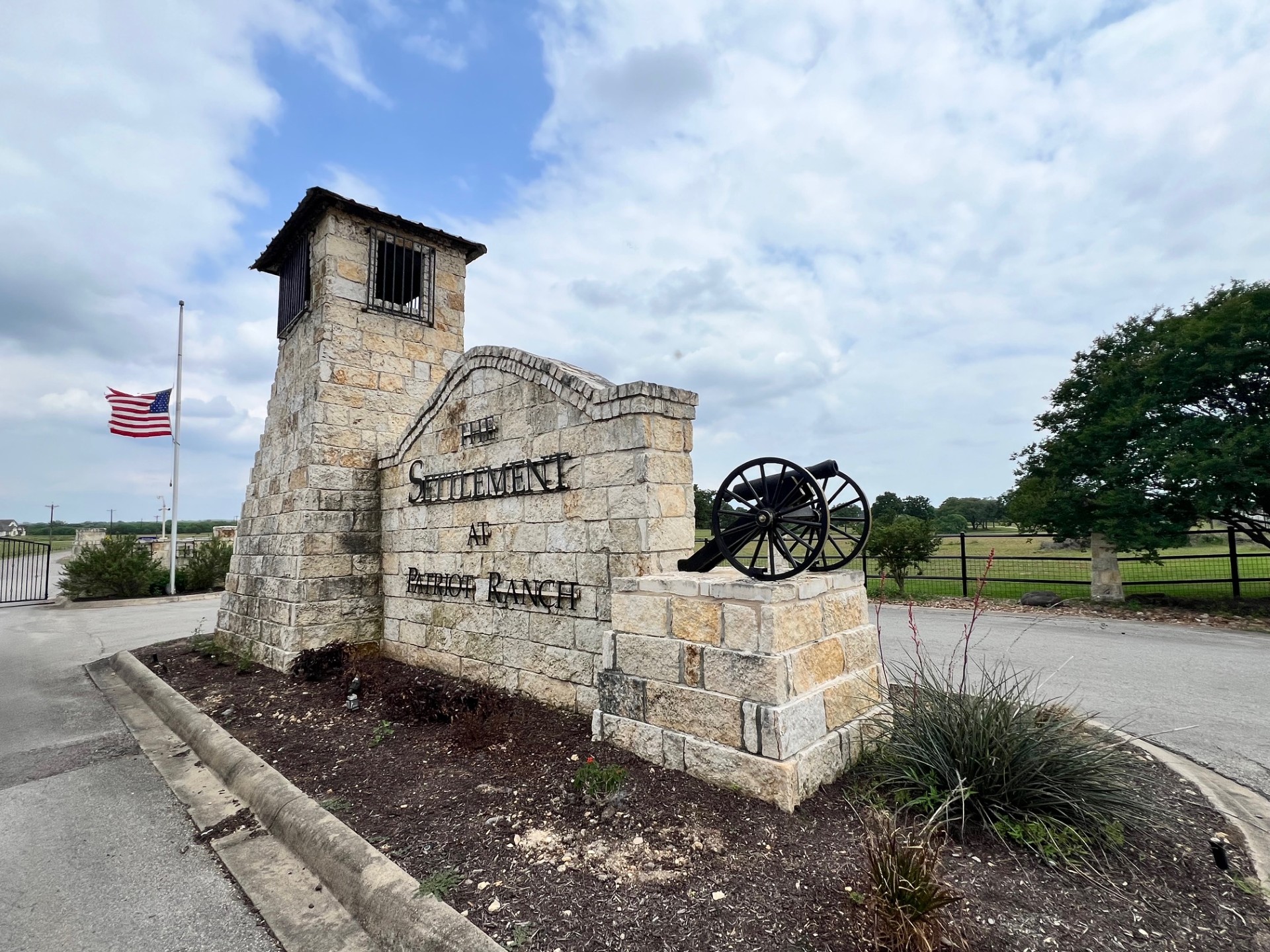 Lot 17 Settlement Way Luling, TX 78648 - Photo 12 of 14 Stone masonry entrance marks a distinguished community with open vistas.