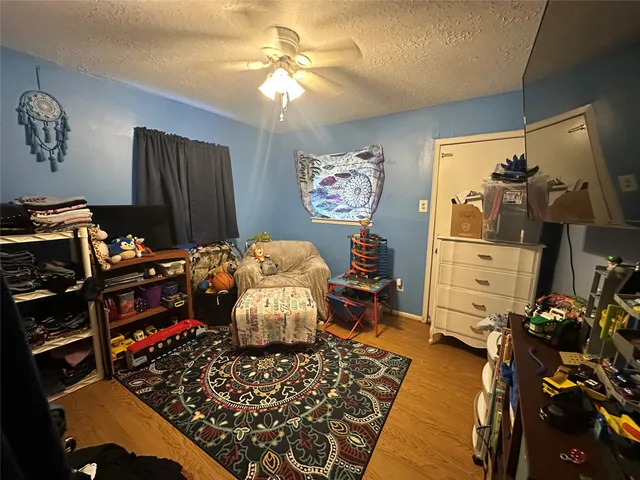 a room with lots of different colored cloths