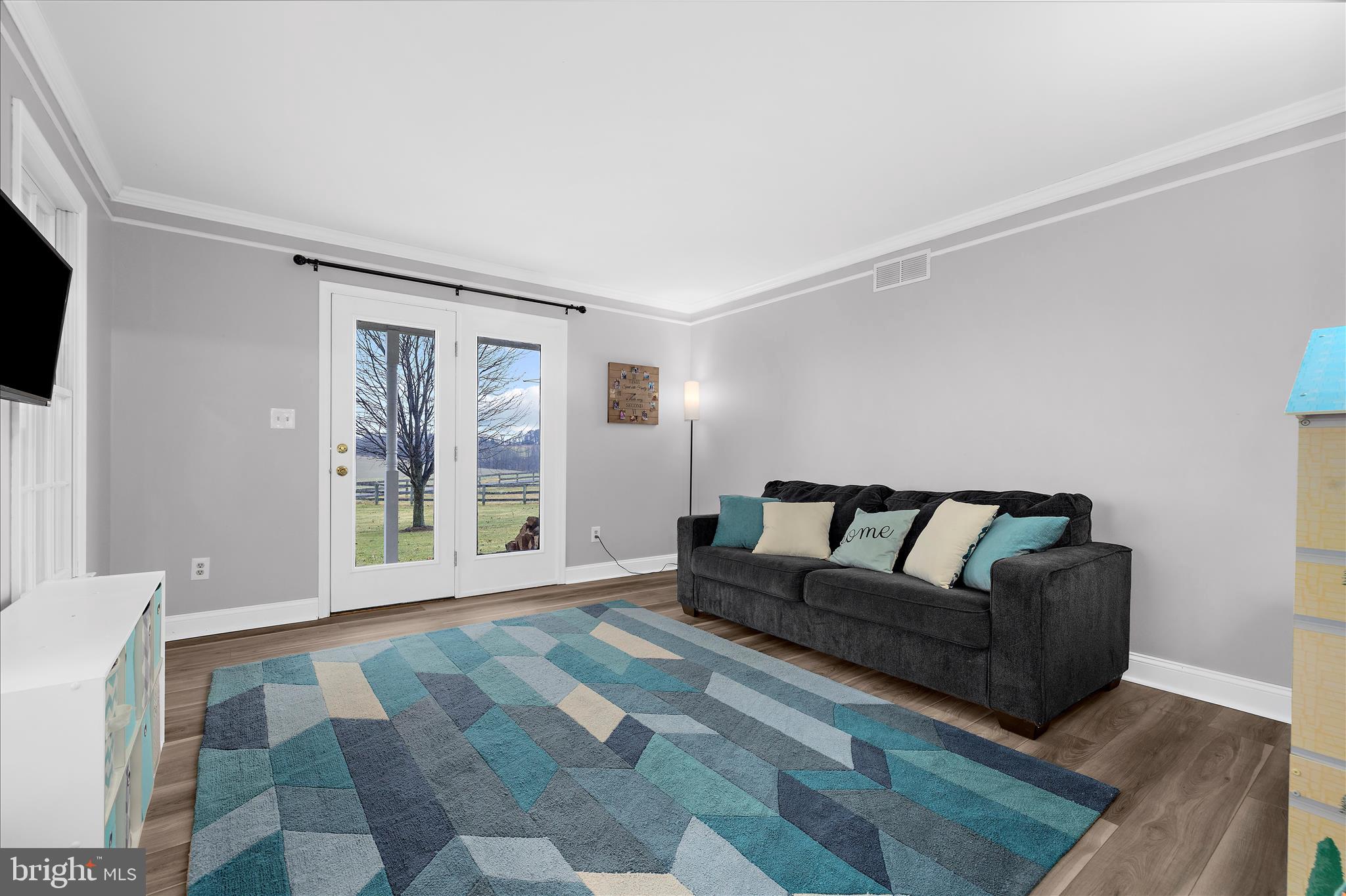 847 Stansbury Road Pylesville, MD 21132 - Photo 12 of 55 Living Rm with access to wrap around porch