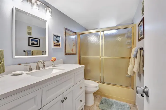 a view of building with large windows