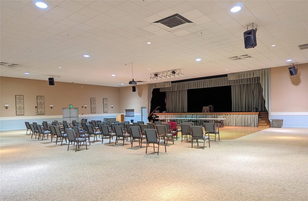 2615 Northeast 3rd Street, Unit 301 Boynton Beach, FL 33435 - Photo 57 of 67 a living room with lots of furniture and kitchen view