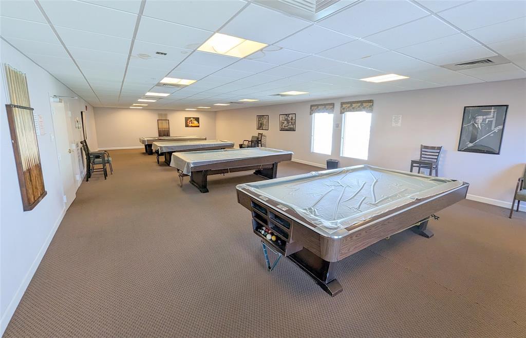 2615 Northeast 3rd Street, Unit 301 Boynton Beach, FL 33435 - Photo 60 of 67 a room with pool table and windows