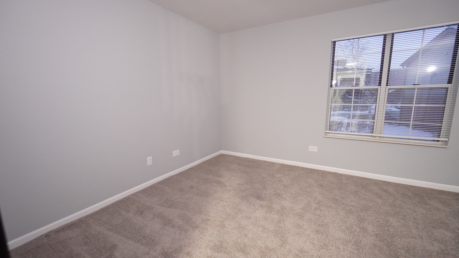 123 West Willowbrook Court, Unit 3 Schaumburg, IL 60195 - Photo 15 of 25 a view of an empty room with a window