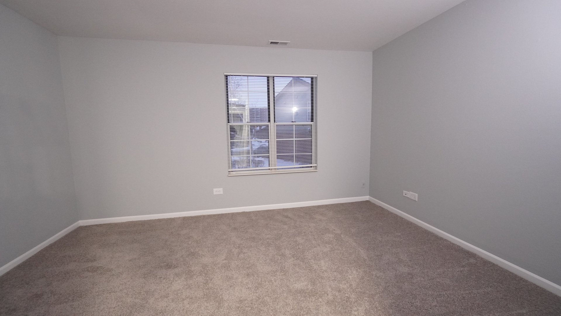 123 West Willowbrook Court, Unit 3 Schaumburg, IL 60195 - Photo 16 of 25 an empty room with windows