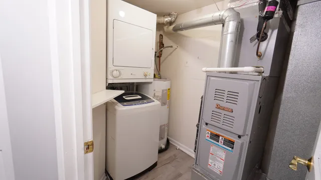 a view of storage and utility room with washer and dryer