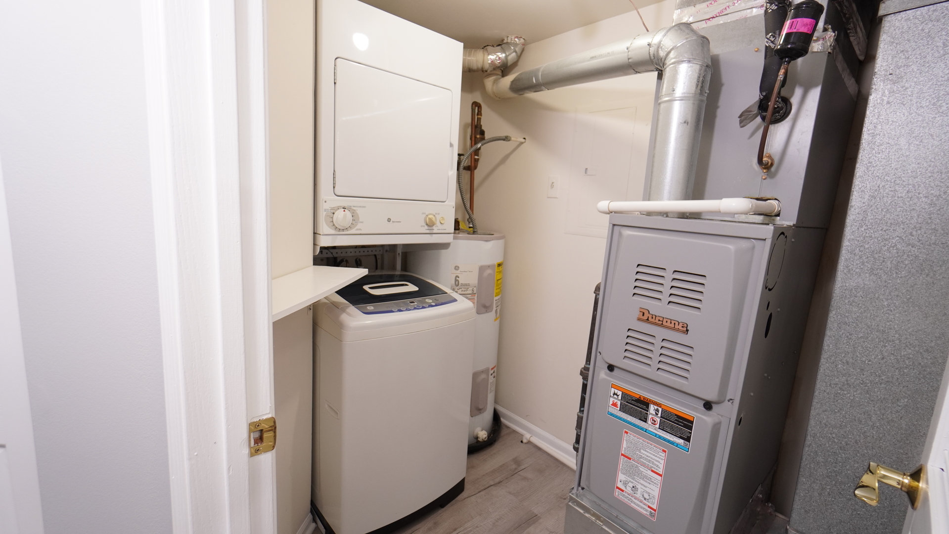 123 West Willowbrook Court, Unit 3 Schaumburg, IL 60195 - Photo 20 of 25 a view of storage and utility room with washer and dryer