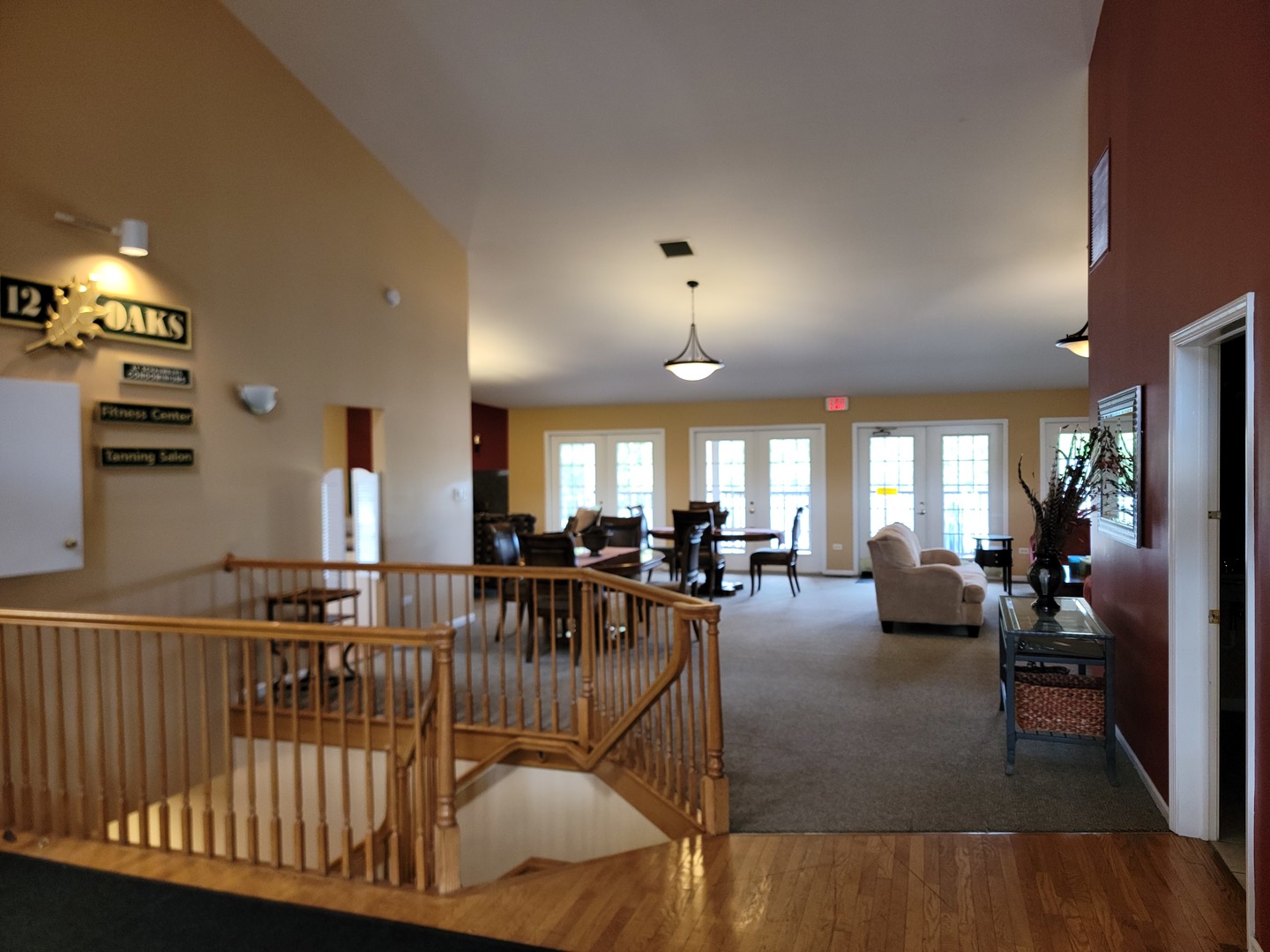 123 West Willowbrook Court, Unit 3 Schaumburg, IL 60195 - Photo 24 of 25 a living room with lots of furniture and white walls