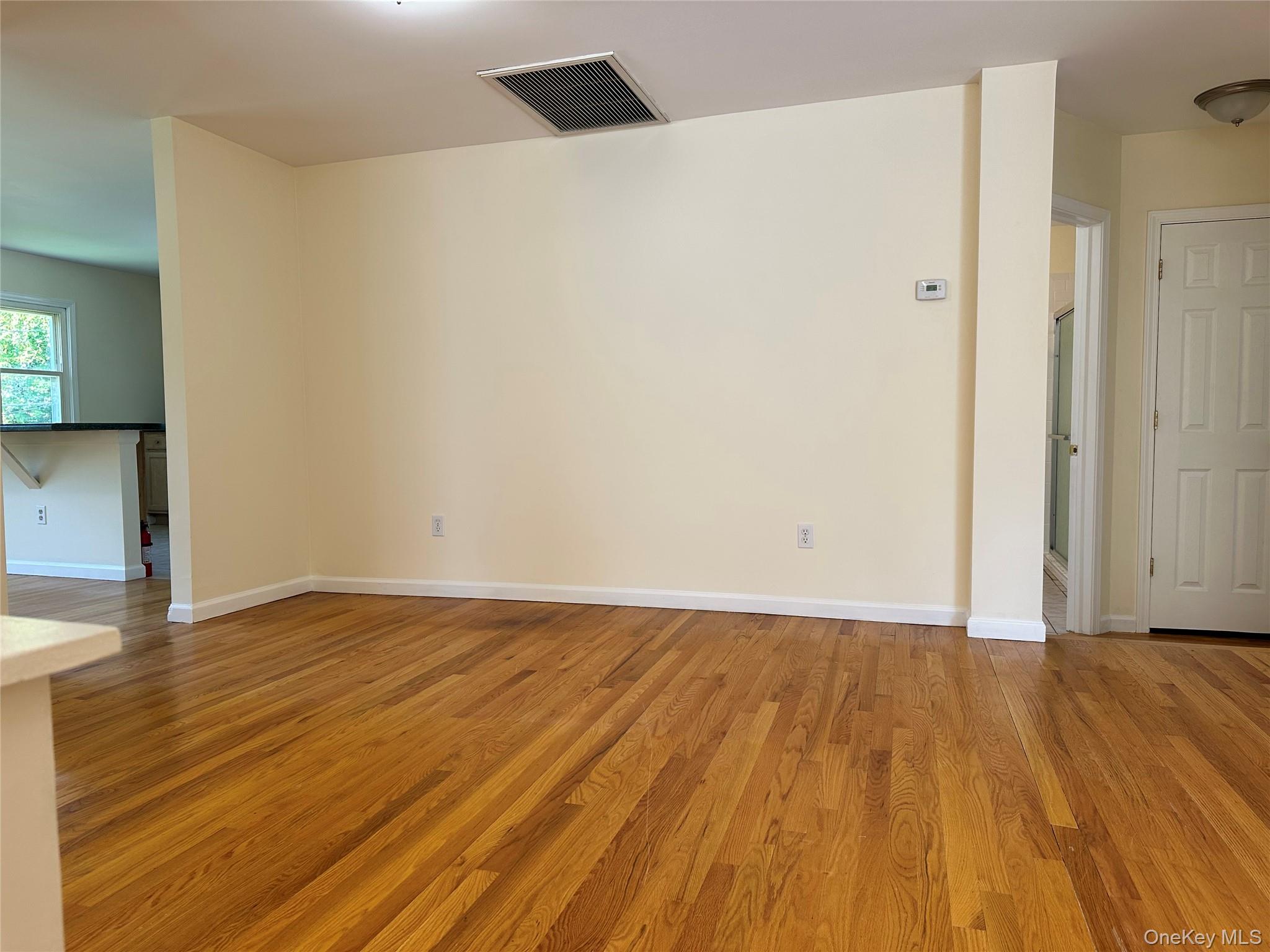 14 Givens Lane Fishkill, NY 12524 - Photo 12 of 20 a view of an empty room with wooden floor