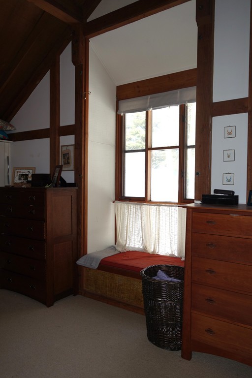 53 Pine Grove, Unit 53 Amherst, MA 01002 - Photo 13 of 24 a bedroom with furniture and a window