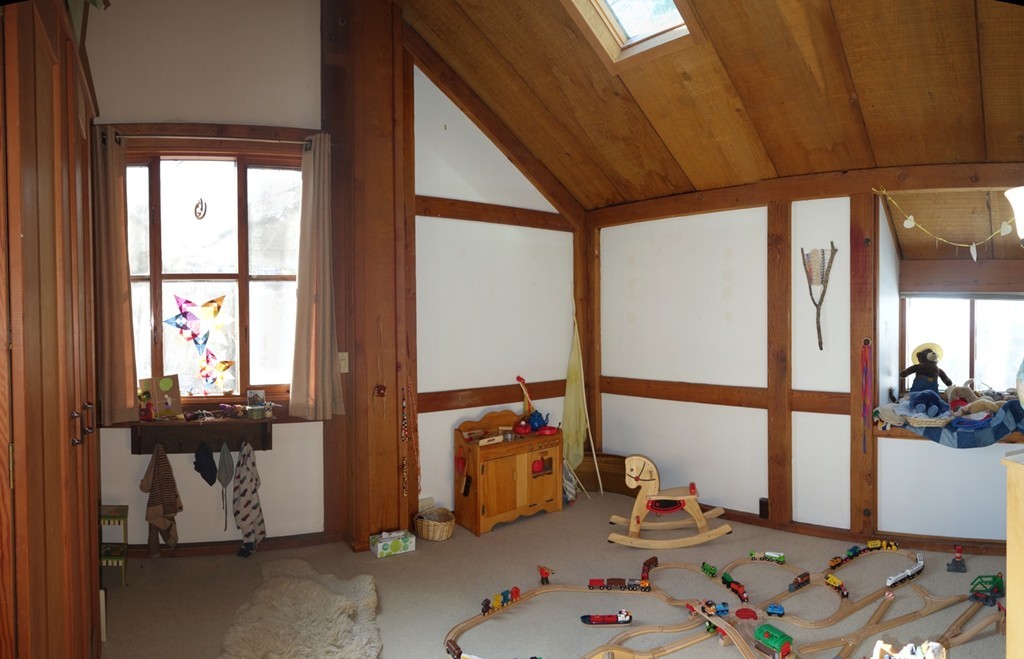 53 Pine Grove, Unit 53 Amherst, MA 01002 - Photo 16 of 24 a room with furniture and window