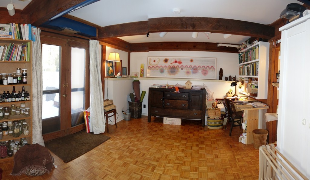 53 Pine Grove, Unit 53 Amherst, MA 01002 - Photo 17 of 24 a room with furniture and a fireplace