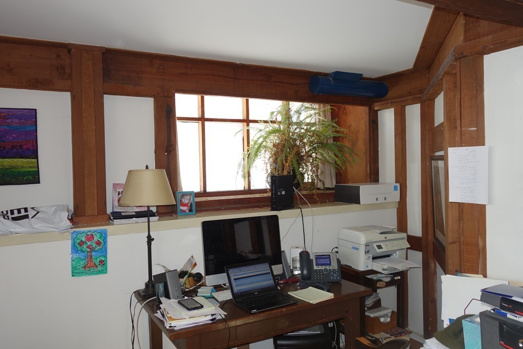 53 Pine Grove, Unit 53 Amherst, MA 01002 - Photo 19 of 24 a view of a workspace with furniture and a window